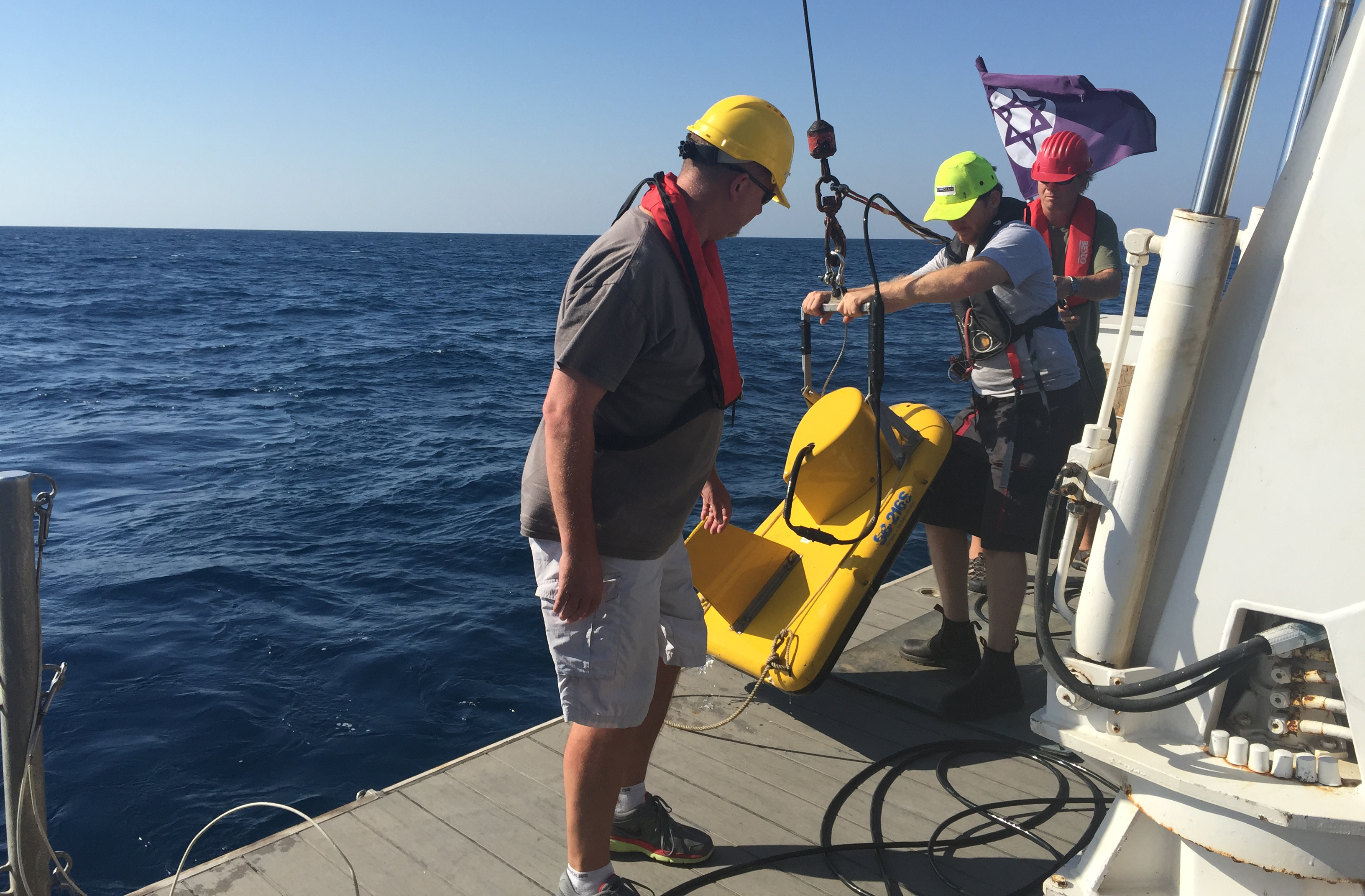 Scientists deploy scientific equipment in the Mediterranean Ocean