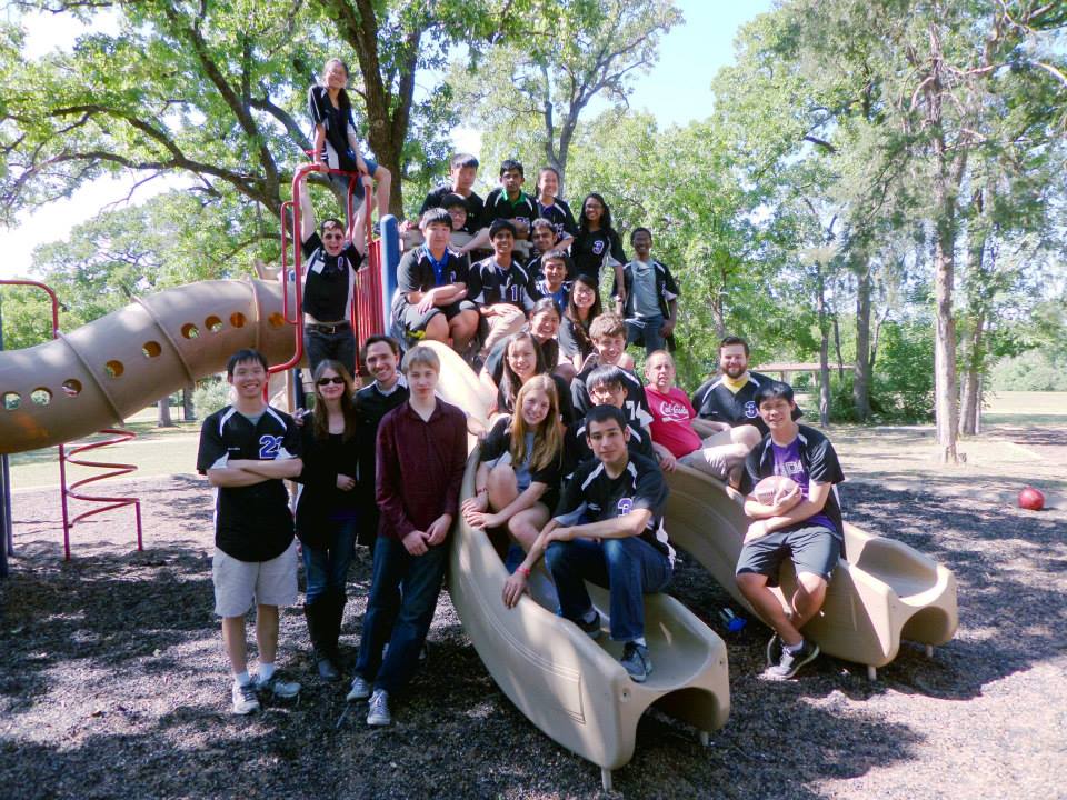 The LASA Science Olympiad team poses on a playground