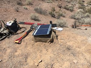 Photo of the newly installed seismic sensor in the desert.