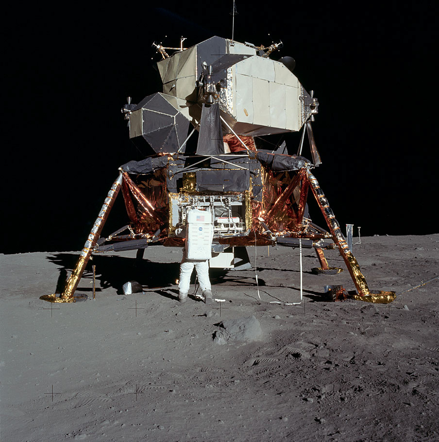 Photo of the lunar module and an astronaut on the moon's surface.