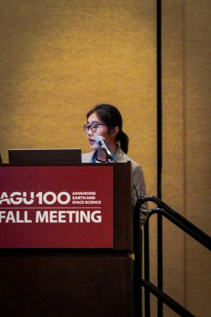 Xian Wu presents a talk at AGU