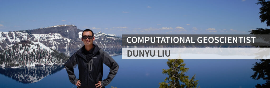 Dunyu Liu standing in front of mountain and lake