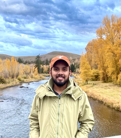 Portrait of Bhargav near a river and autumn landscape