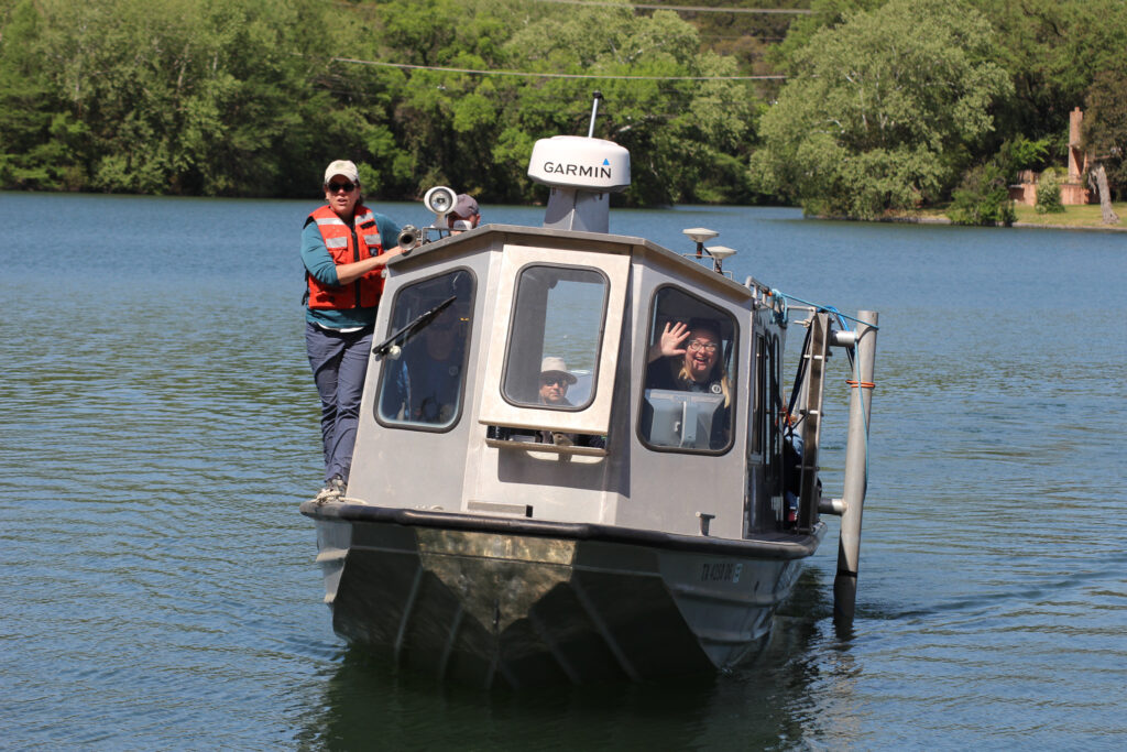 The boat approaches shore