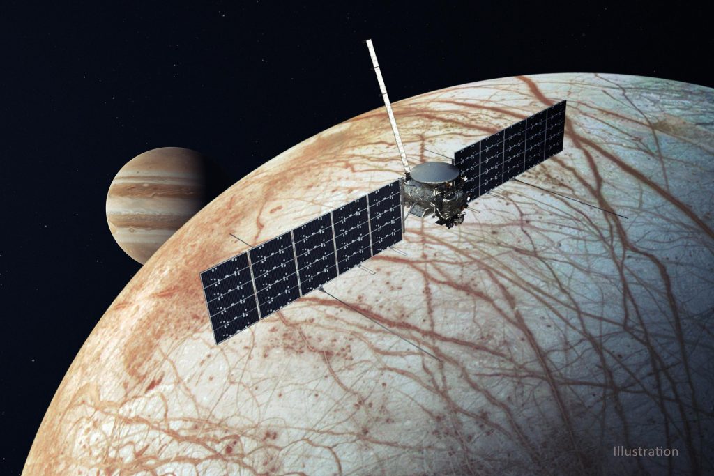 Illustration of a spacecraft with its solar panels and antenna extended in front of a red streaked ice world with Jupiter behind.