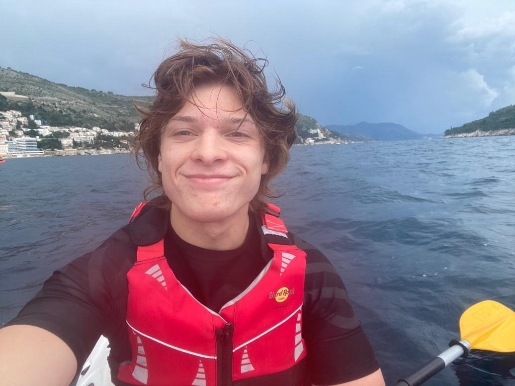 Selfie of Jason Bott on a canoe (or kayak).