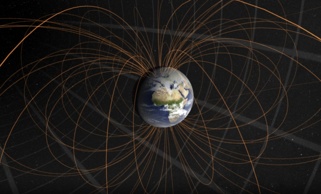 Illustration of Earth from space lines tracing the tracing the magnetic field looping from pole to pole.