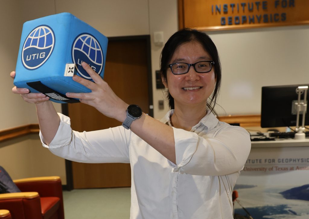 Ann Chen holding the UTIG Block