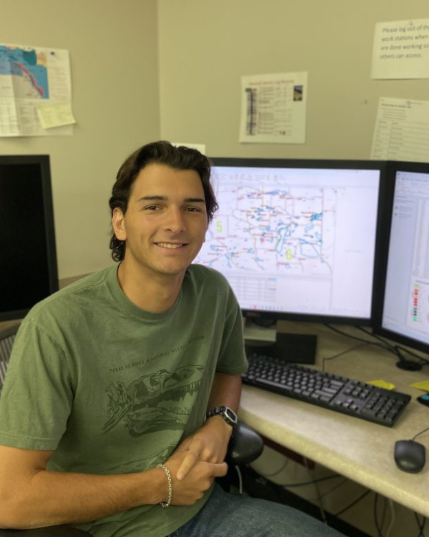 Corbin Poehl at a computer.