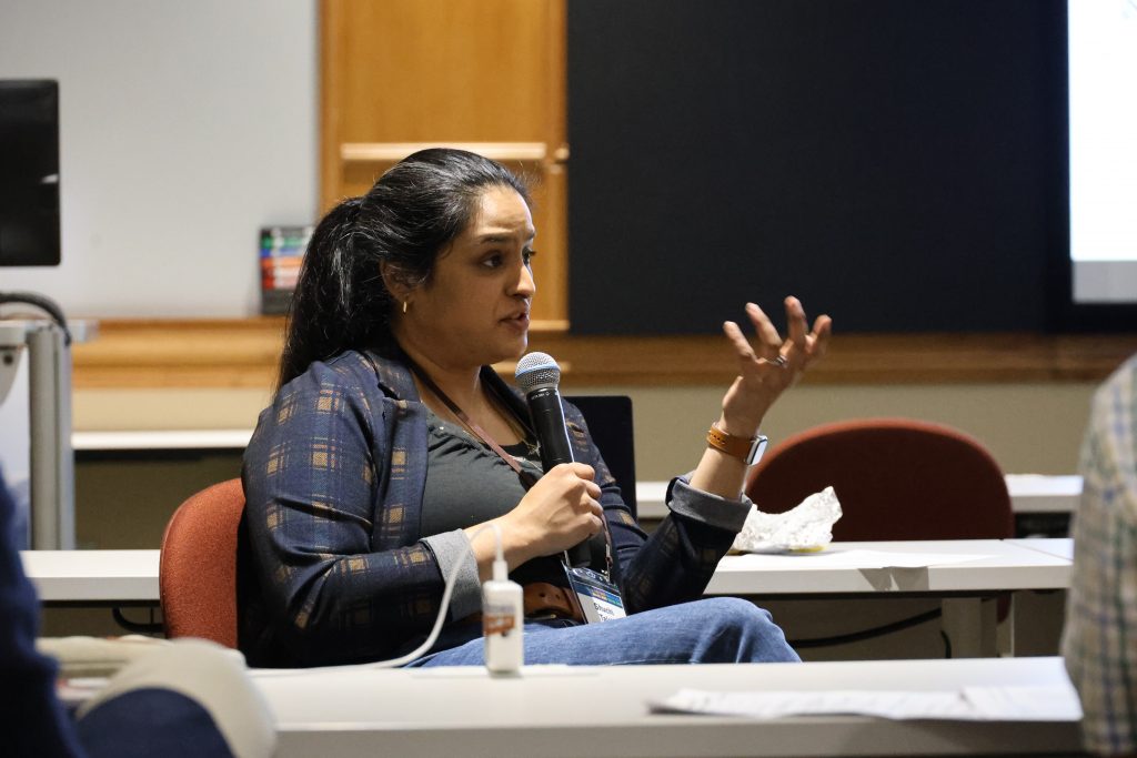 Keynote speaker Shuchi Talati sitting and speaking to workshop attendees